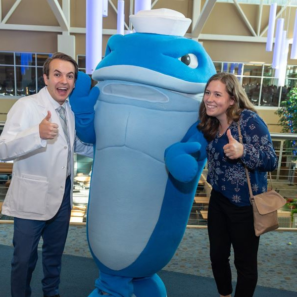 Nate, the Walking Whale, with NEOMED students